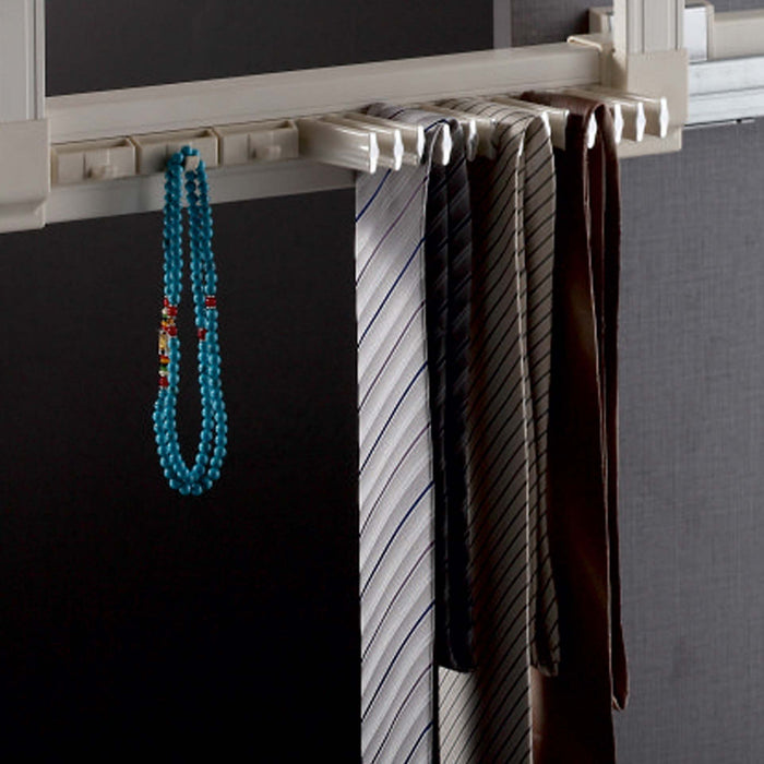 TIE RACK WITH SOFT-CLOSING MECHANISM